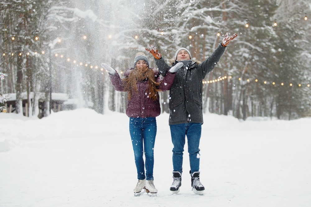 Finger Lakes Bed and Breakfast, happy couple in the snow ice skating 