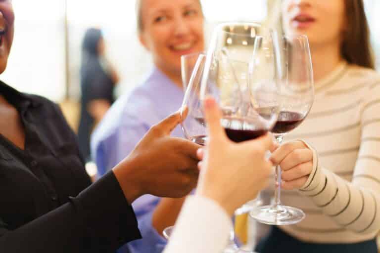 Welcome 35 Fox Run Vineyards, photo of women wine tasting in the Finger Lakes