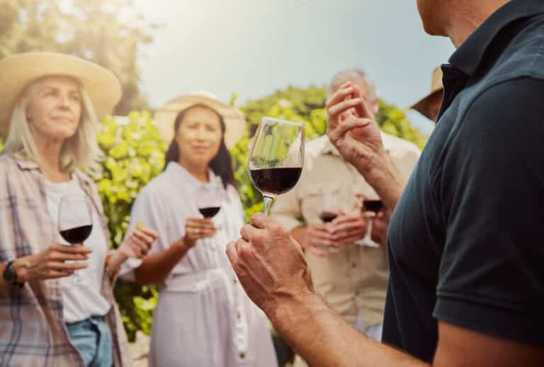 People in the Fox Run Winery vineyard on tour and tasting.
